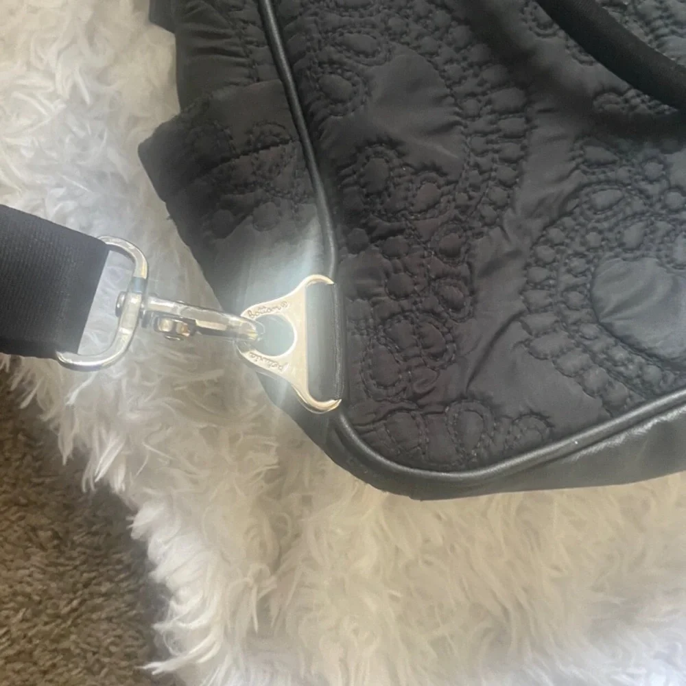 Petunia Pickke Bottom convertible embossed backpack purse / diaper bag